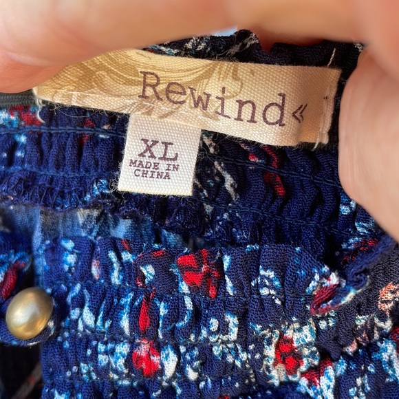 A Rewind Woman’s NWT Romper Size Xl Blue Red Floral with Pom Pom trim on hem - Picture 6 of 9